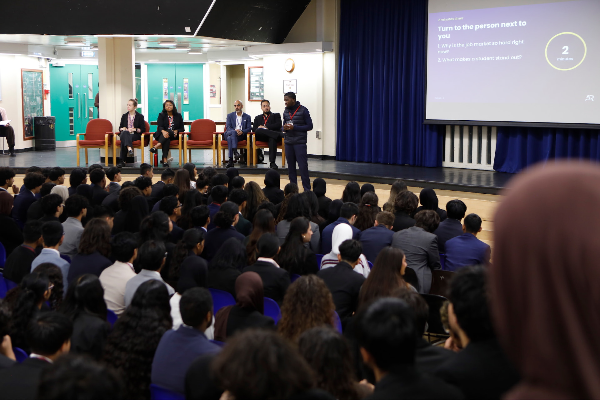 Students at the Heathland School assembly taking part in a discussion exercise